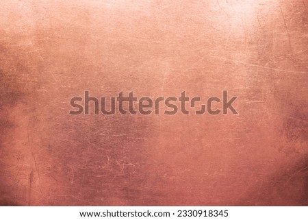 Old brass or copper background, texture of a vintage orange metal plate