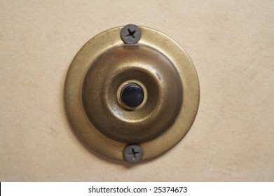 Old brass doorbell button