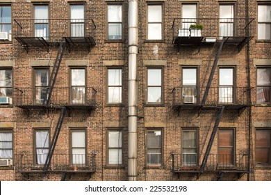 Old Brick Building With Fire Escapes In Front, Manhattan, New York