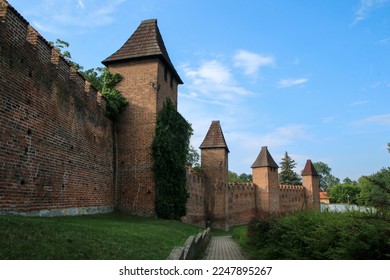 The old, brick city walls of the city of Nymburk in Czech Republic. The nice landmark and attraction for the tourists. - Shutterstock ID 2247895267