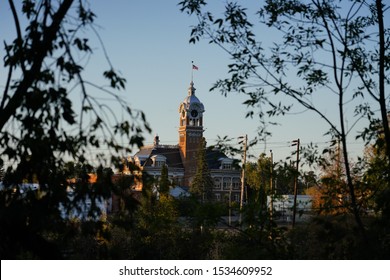 Old brick courthouse clock tower, towers over the city