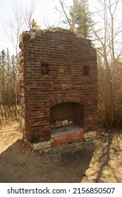 Old Brick Fireplace Remains In The Woods From An Old Ranch House