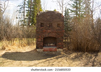 Old Brick Fireplace Remains In The Woods From An Old Ranch House