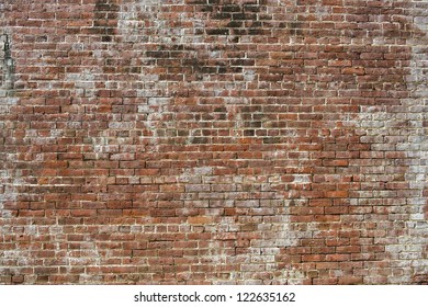 Old brick wall in a background image - Shutterstock ID 122635162