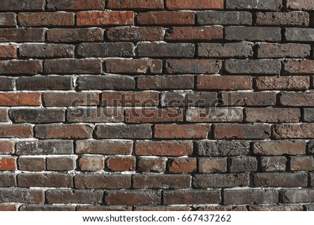 Old brick wall in a background. Use this image for background, design, game development.