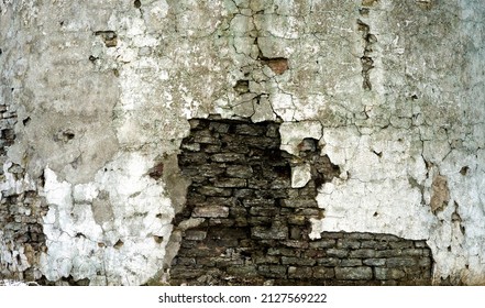 Old brick wall with destroyed plaster. Renovation of old house. Industrial style design wall background. High quality photo - Shutterstock ID 2127569222