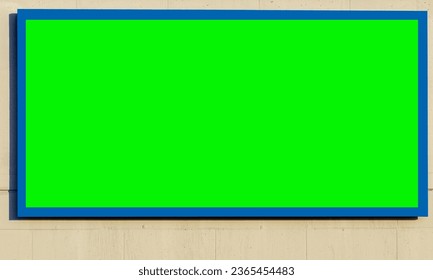 old brick wall and green screen picture frame illuminated with spotlights. original green screen color frame. - Shutterstock ID 2365454483