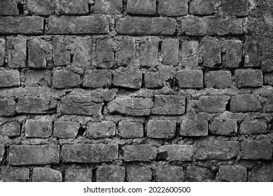 An old brick wall with patters as an  Abstract in black and white
