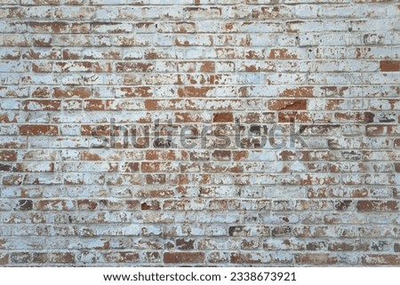 old brick wall, red and white colour, broken bricks, peeling plaster, vintage texture, background for banner, copy space
