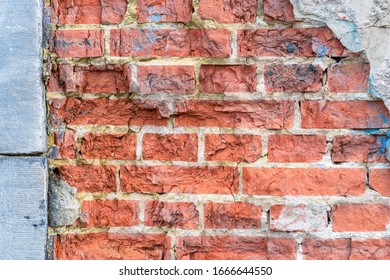 Old Brick Wall With Rough Structure And Natural Stone Edge