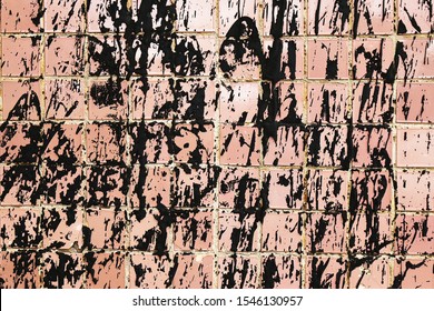 old brick wall splashed with molten resin