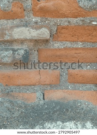 old brick wall texture background with rough cement and weathered surface red brick masonry with grunge texture perfect for construction. industrial and vintage design projects. high resolution background texture.