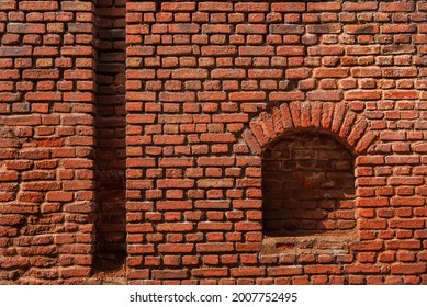 old brick wall with window
