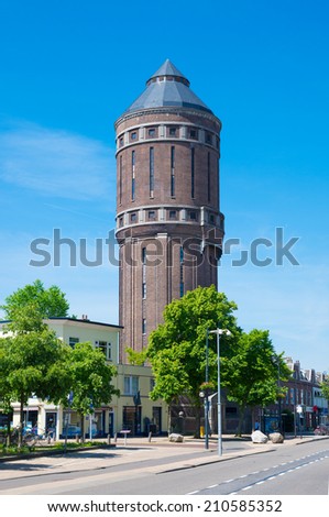 old brick water tower in utrecht, netherlands. Built around 1917, it has a 1000 cubic meters reservoir and a height of 43,5 meter