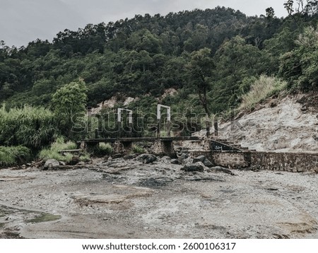old bridge in the middle of the forest and beb
