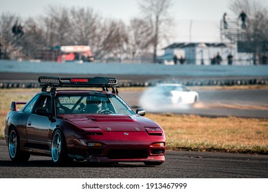 OLD BRIDGE, NJ - NOVEMBER 20, 2020: Club Loose drift event called Stuffed Moves - 180sx just finishing his lap with some drifting going on in the back