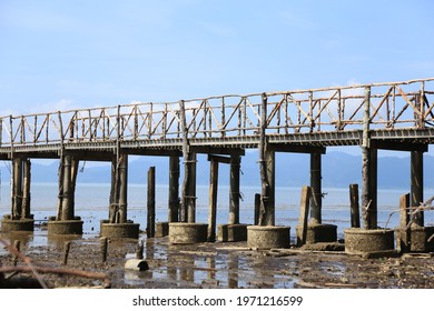 old bridge on the beach