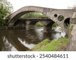 The Old Bridge Pontypridd in South Wales spans the River Taff. It