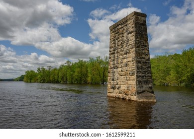 Old Bridge Support In St. Croix River In Summer