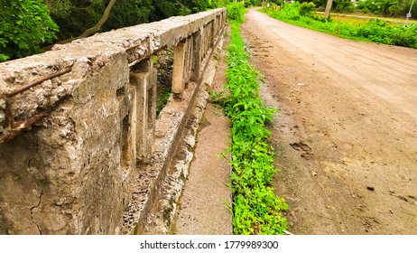 Old British Aged Bridge Street Way Over River In Rural Area. Connecting Two Villages.