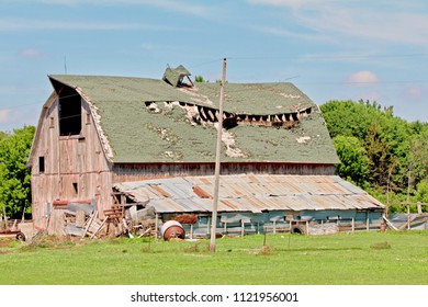The old broken barn is falling down.