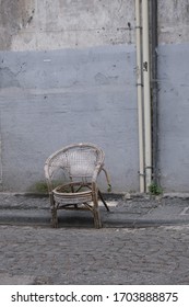 Old Broken Chair On The Street