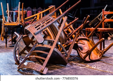 Old broken furniture. A pile of wooden wreckage of the chairs. Antiques.