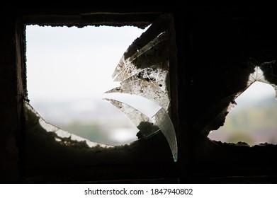 Old Broken Glass Window with Dirt