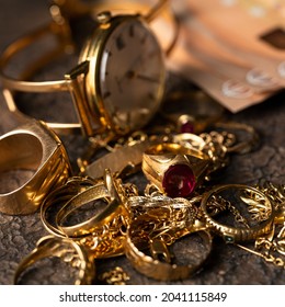 Old And Broken Jewelry  And On Euro Banknotes On Dark Background. Cash For Gold Concept. 