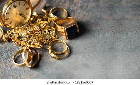 Old and broken jewelry, vintage watches on dark background. Sell  gold  for cash concept.  - Shutterstock ID 1921560809