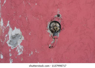 Old Broken Light Switch On The Wall