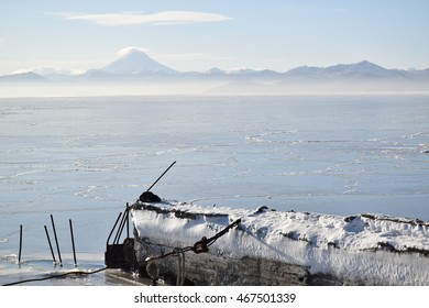 Old Broken Mooring, Ice And Volcano