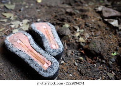 Old Broken Neglected Shoes In The Ground Waiting For A Chance To Reborn