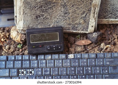 An Old Broken Pager And Keyboard