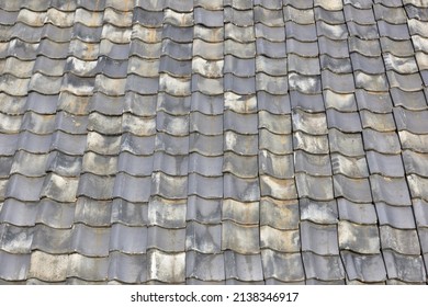 Old And Broken Roof Tiles.