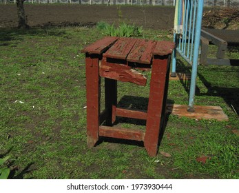 Old broken stool in the yard.