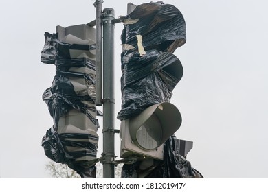 Old Broken Traffic Light Covered With Film