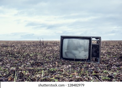 Old Broken TV Is An Autumn Field