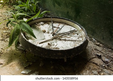 Old Broken Wall Clock In An Abandoned House