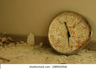 Old Broken Wall Clock In The Garbage