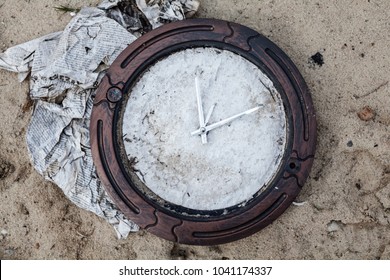 Old Broken Wall Clock Without Numerals On The Clock Face.