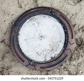 Old Broken Wall Clock Without Numerals On The Clock Face.