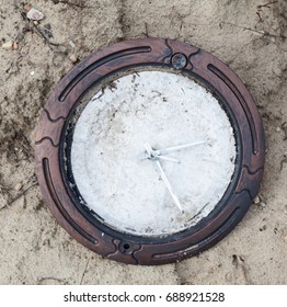 Old Broken Wall Clock Without Numerals On The Clock Face.