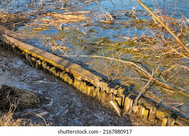 Old Broken Wooden Footbridge Over Virlya Lake In Western Ukraine.