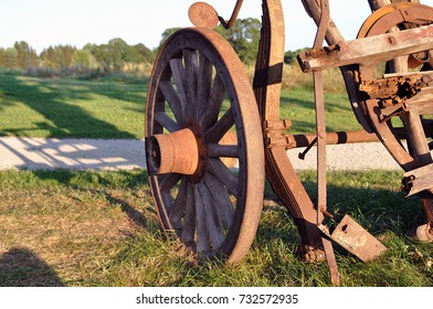Old Broken Wooden Wagon on a Farm close up of wagon wheel
