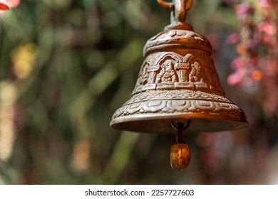 Old bronze bell in indian temple with blur background. Hindu temple brass bell hanging in gold color - Shutterstock ID 2257727603
