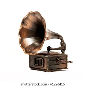 Old bronze Phonograph over white background. Isolated