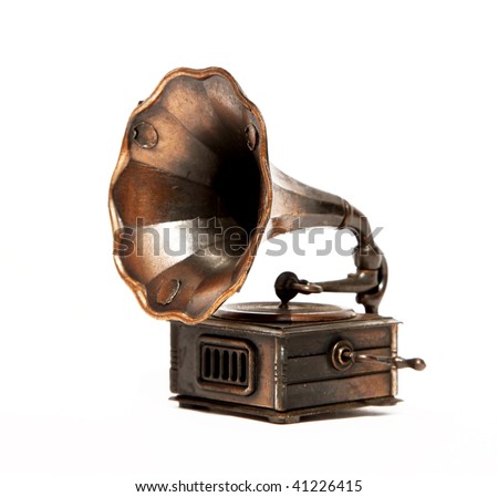 Old bronze Phonograph over white background. Isolated
