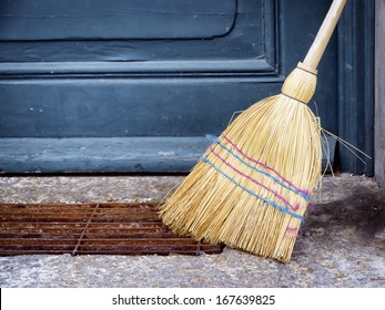 Old Broom At A Door