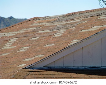 Old Brown Asphalt Shingle Roof